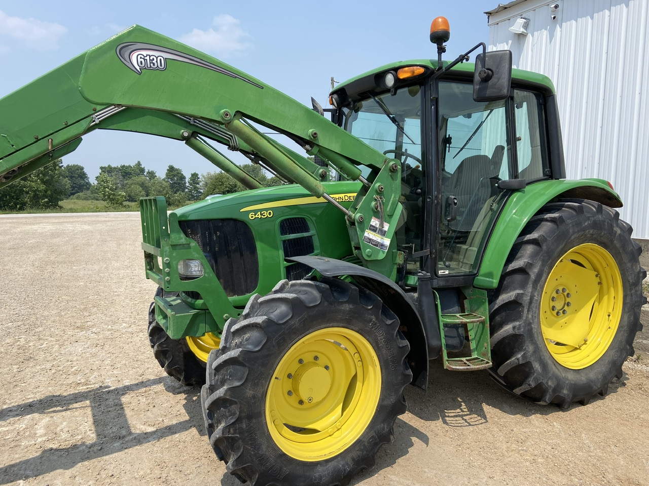 Huron Tractor | Used Equipment | JD 6430/LDR (E90329)